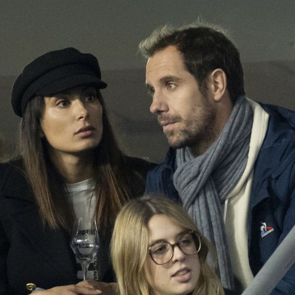 Richard Gasquet et sa compagne Clementine dans les tribunes lors de la demi-finale de la Coupe du Monde de Rugby opposant l'Argentine à la Nouvelle Zélande (6 - 44) au Stade de France à Saint-Denis, France, le 20 octobre 2023. © Cyril Moreau/Bestimage