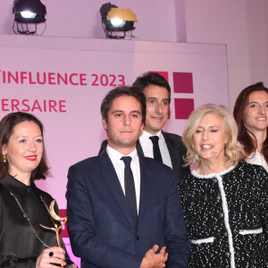 Gabriel Attal (Ministre de l'éducation), Patricia Chapelotte (Présidente du Prix) et les Lauréates dont Valérie Masson-Delmotte, Marie-Pierre Rixain, Claude Grison, Josephine Goube et Sarah Koné - 10ème édition du Prix de la Femme d'Influence au musée de l'homme à Paris le 5 décembre 2023. © Bertrand Rindoff / Bestimage 