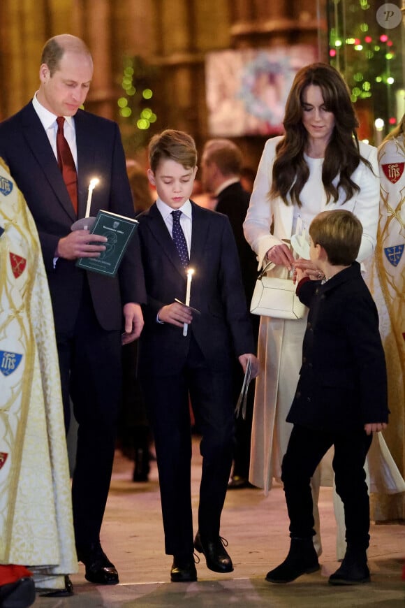 Le prince William, prince de Galles, et Catherine (Kate) Middleton, princesse de Galles, avec leurs enfants le prince George de Galles, et le prince Louis de Galles - Traditionnel concert de Noël "Together At Christmas" en l'abbaye de Westminster à Londres. Le 8 décembre 2023.