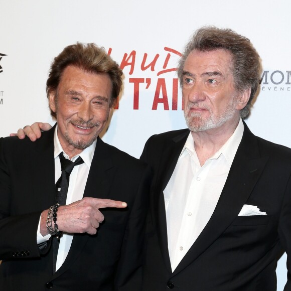 L'ami éternel de Johnny Hallyday a trouvé qu'il y avait trop de "bruit".
Johnny Hallyday et Eddy Mitchell - Avant-première de 'Salaud on t'aime' à l'UGC Normandie sur les Champs-Elysées à Paris le 31 mars 2014.
