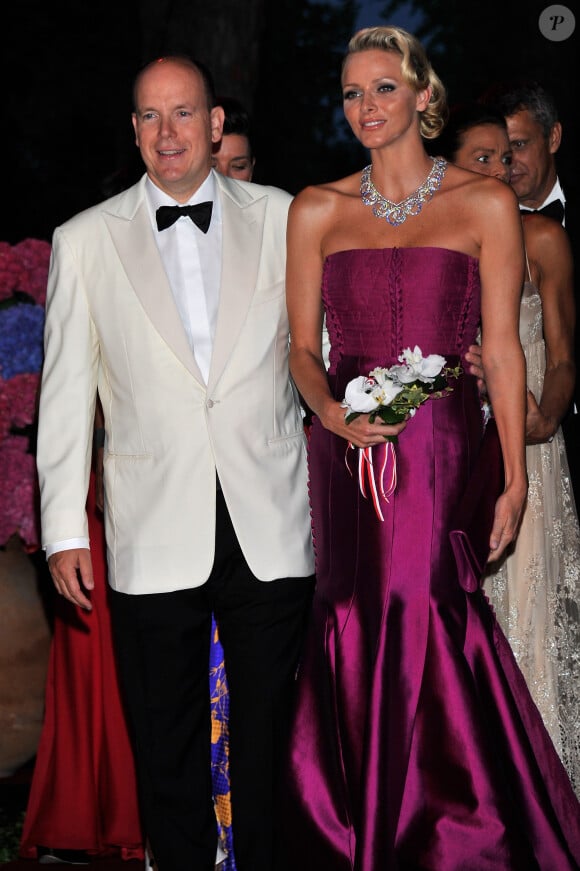 Prince Albert II de Monaco et sa femme, la Princesse Charlene de Monaco - Arrivée au 63ème bal de la Croix Rouge au Sporting Club Salle des Etoiles deMonaco, le 5 août 2011.