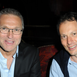 Il fait tout pour que BFMTV reste leader
Laurent Ruquier et Marc-Olivier Fogiel - Soirée de lancement du livre "Radiographie" de Laurent Ruquier au Buddha-Bar à Paris, le 16 juin 2014.