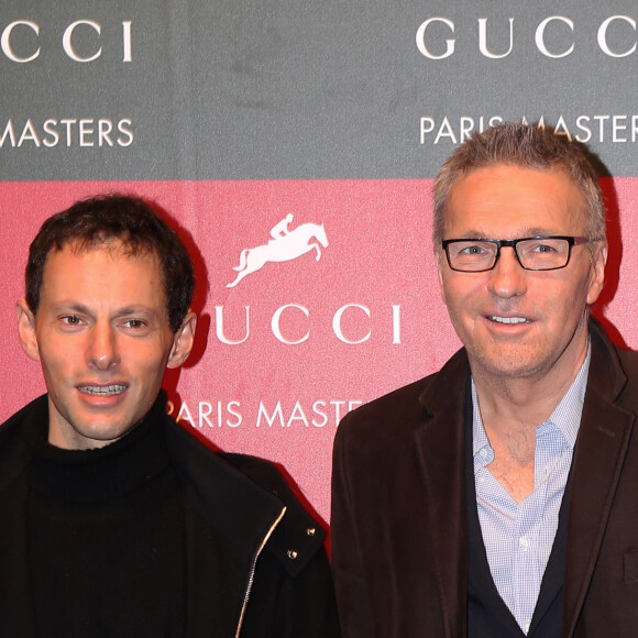 Marc Olivier Fogiel et Laurent Ruquier - Remise des prix du Gucci Paris Masters 2012 remporte par Marc Houtzager devant Denis Lynch et Alvaro de Miranda a Villepinte le 2 Decembre 2012. 