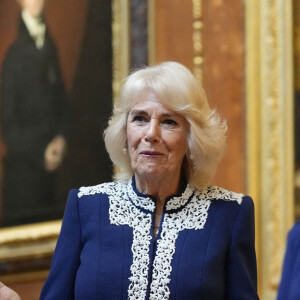 Camilla Parker Bowles, reine consort d'Angleterre, lors d'une réception avec les participants de la nouvelle collection de la bibliothèque miniature, au château de Windsor. Le 30 janvier 2024