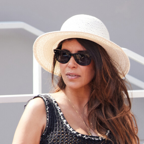 Reem Kherici, enceinte, et son mari Gilles Lemaire dans les tribunes lors des Internationaux de France de Tennis de Roland Garros 2023. Paris, le 7 juin 2023. © Jacovides / Moreau / Bestimage 