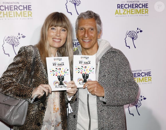 Nagui et sa femme Mélanie Page - Photocall du XVème gala pour la Fondation Recherche Alzheimer à l'Olympia à Paris le 14 mars 2022. © Photo Marc Ausset-Lacroix/Bestimage