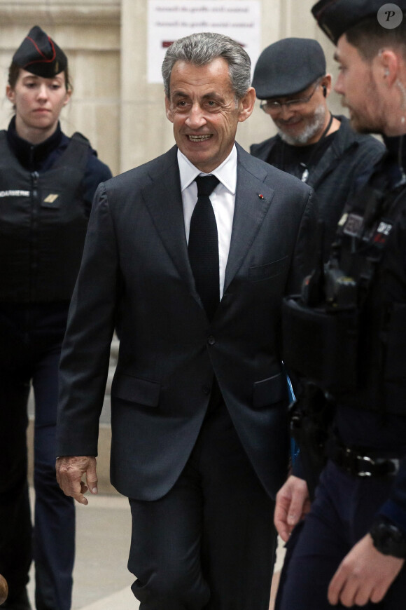 L'ex président Nicolas Sarkozy lors de l'ouverture de son procès en appel dans l'affaire Bygmalion sur le financement illégal de sa campagne présidentielle perdue de 2012, au Palais de justice, Ile de la Cité, à Paris, France, le 8 novembre 2023. © Stéphane Lemouton/Bestimage 