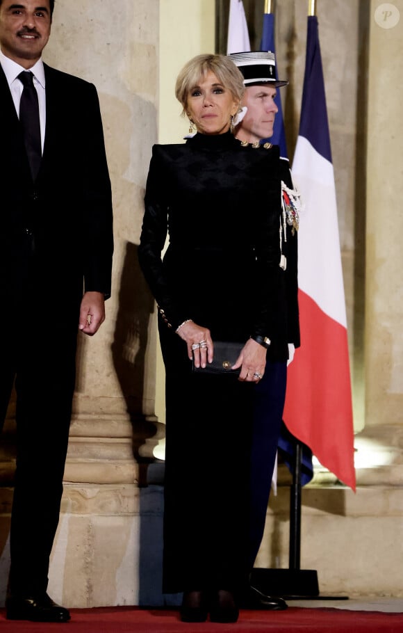 Brigitte Macron et son altesse Tamim ben Hamad Al Thani, emir du Qatar - Arrivées au dîner d'état en l'honneur de l'Emir du Qatar au palais présidentiel de l'Elysée à Paris le 27 février 2024. © Dominique Jacovides / Bestimage 