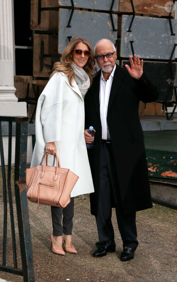 Céline Dion et son mari René Angélil quittent leur hôtel pour se rendre à l'enregistrement de l'émission "Vivement Dimanche". Paris, le 27 novembre 2012.