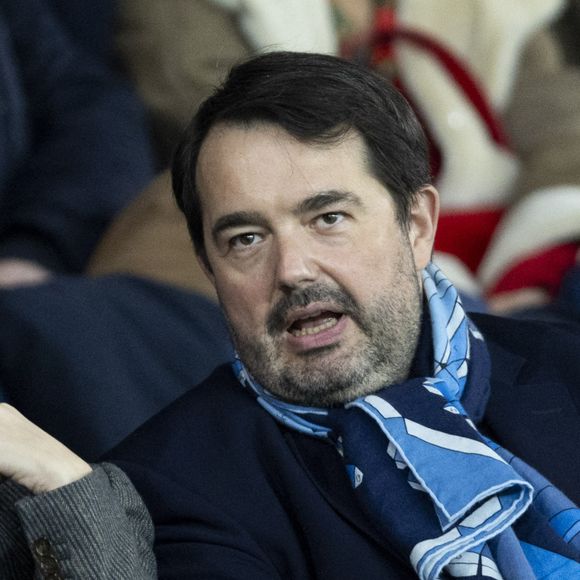 Jean-François Piège et sa femme Elodie - People dans les tribunes du quart de finale de la coupe de France de football entre le Paris Saint-Germain et l'OGC Nice (3-1) au Parc des Princes à Paris le 13 mars 2024. © Cyril Moreau/Bestimage