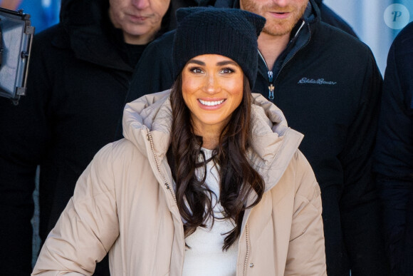 Le prince Harry, duc de Sussex et Meghan Markle, duchesse de Sussex, en visite au camp d'entrainement des athlètes des Invictus Games 2024 à Whistler en Colombie Britannique, le 14 février 2024. 