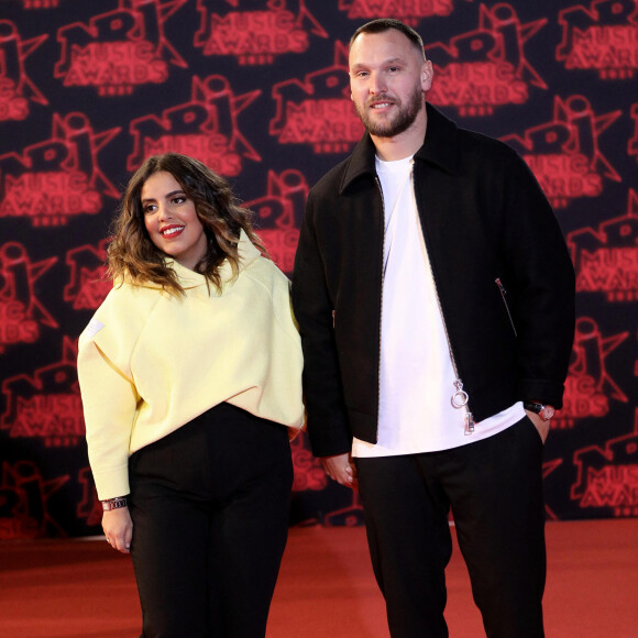Inès Reg et son compagnon Kévin Debonne lors de la 23ème édition des NRJ Music Awards 2021 au Palais des Festivals de Cannes, le 20 novembre 2021. © Dominique Jacovides/Bestimage 