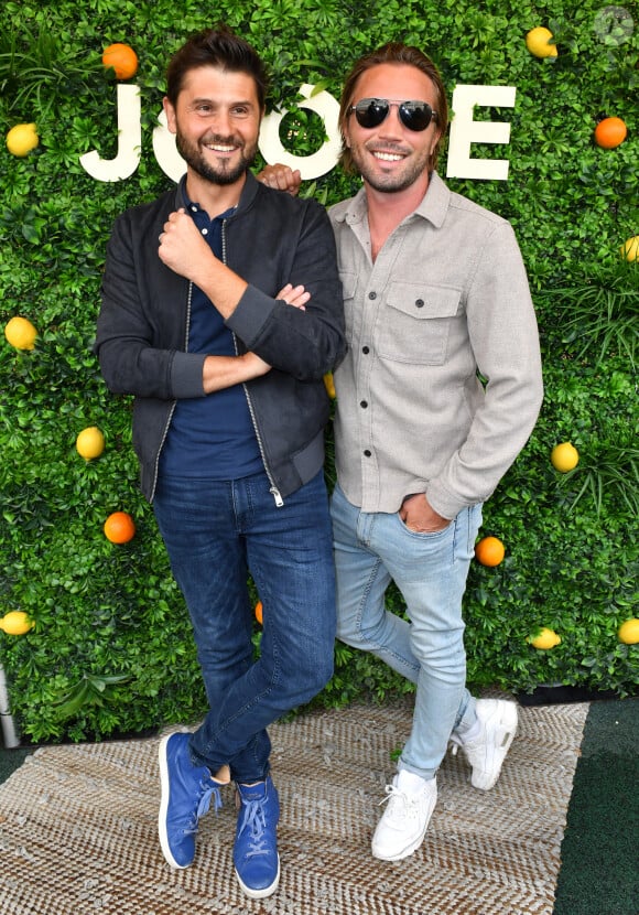 Leur différence d'âge a au départ été un frein pour Christophe Beaugrand
Christophe Beaugrand et son mari Ghislain Gerin - Soirée d'anniversaire des 5 ans de la marque Joone, sur la péniche La Barge à Issy-les-Moulineaux. Paris, le 30 juin 2022 © Veeren / Bestimage