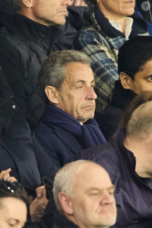 Nicolas Sarkozy - Célébrités dans les tribunes du match de Ligue 1 Uber Eats "PSG-Lyon" (4-1) au Parc des Princes à Paris le 21 avril 2024. © Cyril Moreau/Bestimage