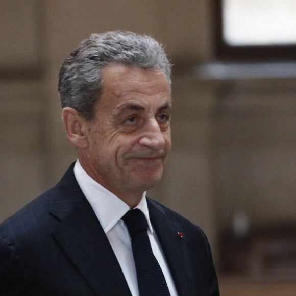 L'ex président Nicolas Sarkozy arrive à son procès en appel dans l'affaire Bygmalion sur le financement illégal de sa campagne présidentielle perdue de 2012, au Palais de justice, Ile de la Cité, à Paris, France, le 24 novembre 2023. © Christophe Clovis/Bestimage 