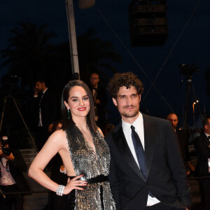 Noémie Merlant et Louis Garrel - Descente des marches du film "L'Innocent" lors du 75ème Festival International du Film de Cannes, France, le 24 mai 2022. © Rachid Bellak/Bestimage