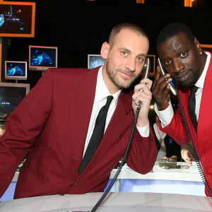 Omar et Fred lors de l'enregistrement du Téléthon 2007 le 8 décembre 2007 à Paris, France. Photo par Max Colin/ABACAPRESS.COM