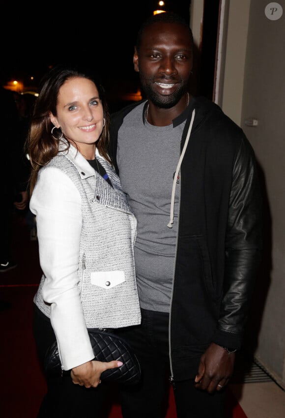 Omar Sy et son épouse Hélène Sy assistent au lancement du nouveau jeu FIFA 2014 (aussi appelé FIFA 14) qui s'est tenu à la Gaite Lyrique à Paris, France, le 23 septembre 2013. Photo par Jerome Domine/ABACAPRESS.COM