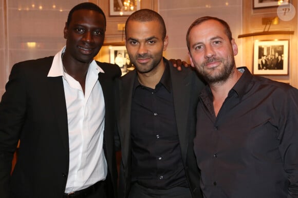 Omar Sy, Tony Parker, Fred Testot lors un cocktail au restaurant de Paul Bocuse L'auberge du Pont de Collonges le 26 septembre 2013. Une des dernières photos d'eux ensemble.