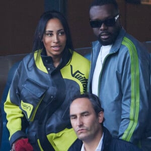 Gims et sa femme Demdem - Célébrités dans les tribunes de la demi-finale retour de Ligue des champions entre le PSG face au Borussia Dortmund (0-1) au Parc des Princes à Paris le 7 mai 2024. © Cyril Moreau/Bestimage