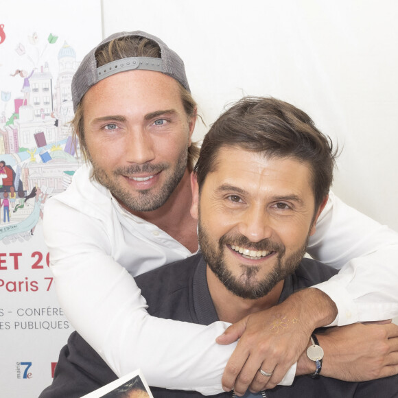 Exclusif - Ghislain Gerin et son mari Christophe Beaugrand - Festival des Livres et des Artistes organisé par l'association "Lecture pour Tous" engagée dans la lutte contre l'illettrisme au Mail Branly à Paris le2 juillet 2022. © Pierre Perusseau/ Jack Tribeca / Bestimage