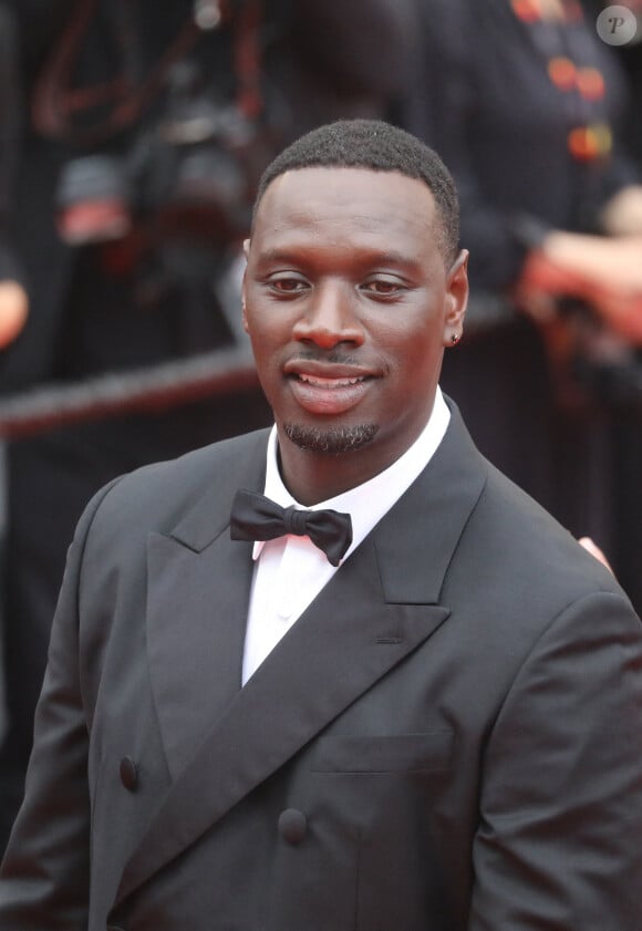 Omar Sy - Montée des marches du film " Top Gun : Maverick " lors du 75ème Festival International du Film de Cannes. Le 18 mai 2022 © Dominique Jacovides / Bestimage 