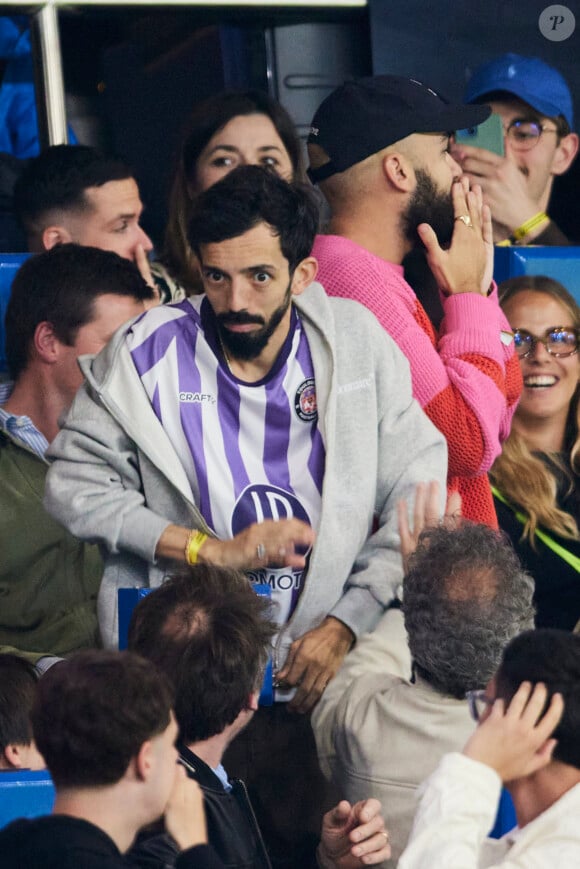 Big Flo et Oli - Célébrités dans les tribunes du match de Ligue 1 Uber Eats "PSG-Toulouse" (1-3) au Parc des Princes à Paris le 12 mai 2024. © Cyril Moreau/Bestimage