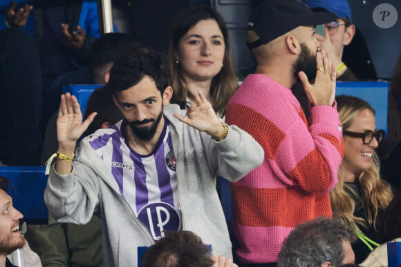 Big Flo et Oli - Célébrités dans les tribunes du match de Ligue 1 Uber Eats "PSG-Toulouse" (1-3) au Parc des Princes à Paris le 12 mai 2024. © Cyril Moreau/Bestimage