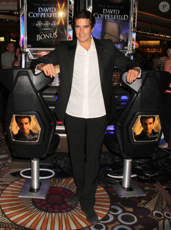 Le magicien David Copperfield dévoile sa nouvelle machine à sous "The Magic Of David Copperfield" à Las Vegas, le 26 juin 2014. 