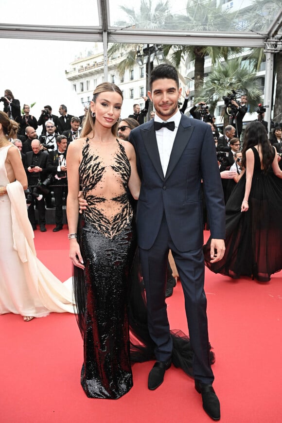 Esteban Ocon et Flavy Barla, montée des marches de "The Apprentice", festival de Cannes, 20 mai 2024. Photo de David Niviere/ABACAPRESS.COM