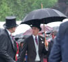 Et sous la pluie !
Le prince William, prince de Galles, et les invités lors de la "Garden Party du Souverain" au palais de Buckingham à Londres, le 21 mai 2024. 