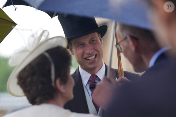 Le prince William, prince de Galles, et les invités lors de la "Garden Party du Souverain" au palais de Buckingham à Londres, le 21 mai 2024. 