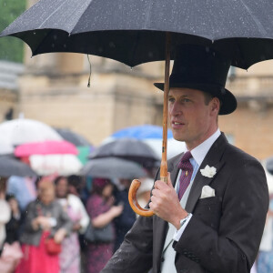 Le prince William, prince de Galles, et les invités lors de la "Garden Party du Souverain" au palais de Buckingham à Londres, le 21 mai 2024. 