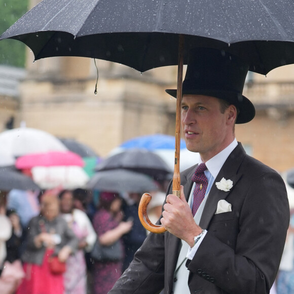 Le prince William, prince de Galles, et les invités lors de la "Garden Party du Souverain" au palais de Buckingham à Londres, le 21 mai 2024. 