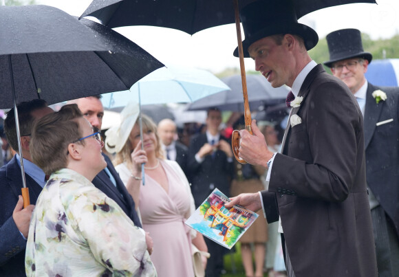 Le prince William, prince de Galles, et les invités lors de la "Garden Party du Souverain" au palais de Buckingham à Londres, le 21 mai 2024. 