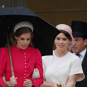 Tout comme leurs cousines, Beatrice et Eugenie. 
La princesse Beatrice d'York, la princesse Eugenie d'York lors de la "Garden Party du Souverain" au palais de Buckingham à Londres, le 21 mai 2024. 