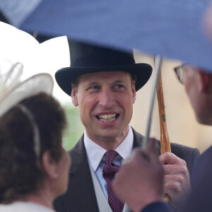 Il était seul, sans sa femme Kate Middleton. 
Le prince William, prince de Galles, et les invités lors de la "Garden Party du Souverain" au palais de Buckingham à Londres, le 21 mai 2024. 