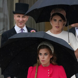 La princesse Beatrice d'York, la princesse Eugenie d'York lors de la "Garden Party du Souverain" au palais de Buckingham à Londres, le 21 mai 2024. 