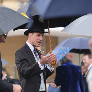 Le prince William, prince de Galles, et les invités lors de la "Garden Party du Souverain" au palais de Buckingham à Londres, le 21 mai 2024. 