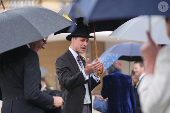 Le prince William, prince de Galles, et les invités lors de la "Garden Party du Souverain" au palais de Buckingham à Londres, le 21 mai 2024. 