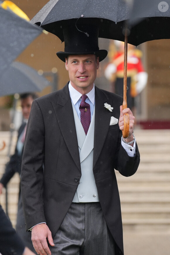 Le prince William, prince de Galles, et les invités lors de la "Garden Party du Souverain" au palais de Buckingham à Londres, le 21 mai 2024. 