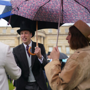 Le prince William, prince de Galles, et les invités lors de la "Garden Party du Souverain" au palais de Buckingham à Londres, le 21 mai 2024. 