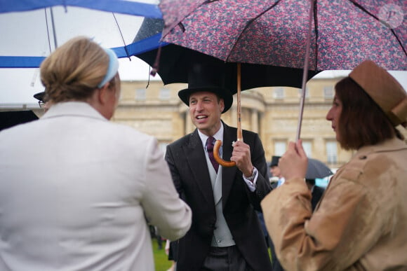 Le prince William, prince de Galles, et les invités lors de la "Garden Party du Souverain" au palais de Buckingham à Londres, le 21 mai 2024. 