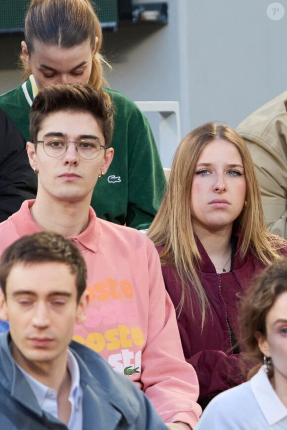 Axel, Héléna, (candidats Star Academy 2024) - Célébrités dans les tribunes des Internationaux de France de tennis de Roland Garros 2024 à Paris le 27 mai 2024. © Moreau-Jacovides/Bestimage