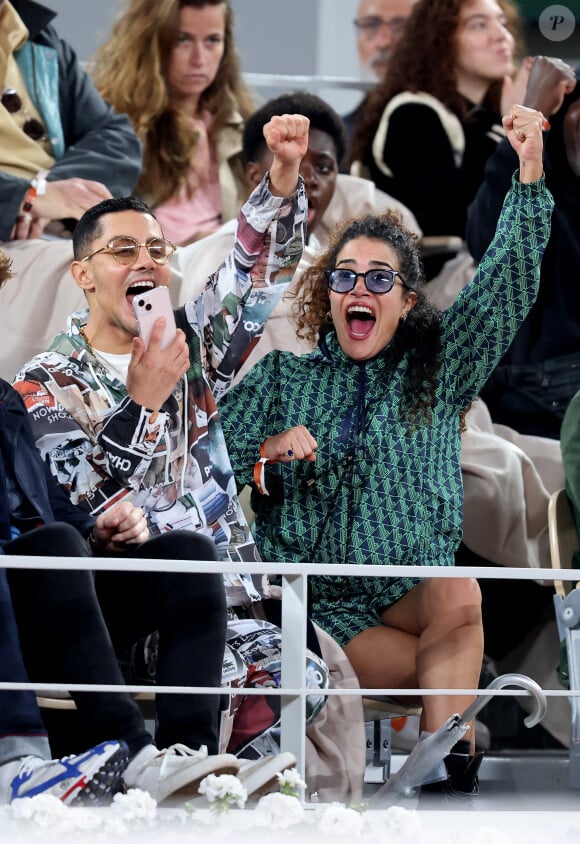 Djanis Bouzyani et Sabrina Ouazani dans les tribunes des Internationaux de France de tennis de Roland Garros 2024 à Paris, France, le 1er juin 2024. © Jacovides-Moreau/Bestimage 