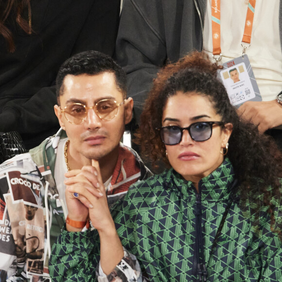 Sabrina Ouazani était avec Djanis Bouzyani
Djanis Bouzyani et Sabrina Ouazani dans les tribunes des Internationaux de France de tennis de Roland Garros 2024 à Paris, France, le 1er juin 2024. © Jacovides-Moreau/Bestimage 