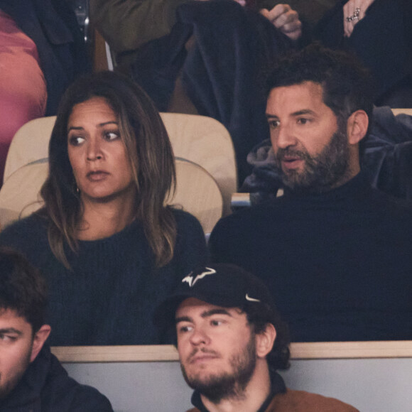 Aurelie Casse et son compagnon dans les tribunes des Internationaux de France de tennis de Roland Garros 2024 à Paris, France, le 1er juin 2024. © Jacovides-Moreau/Bestimage 