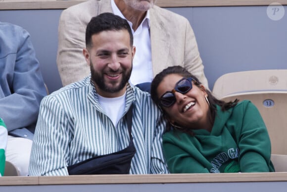 Elle était tout sourire en tribune, en compagnie de son meilleur ami Mickaël Montadir.
Inès Reg (Inès Reghioua) avec son meilleur ami Mickaël Montadir dans les tribunes au même moment dans les tribunes des Internationaux de France de tennis de Roland Garros 2024 à Paris, France, le 3 juin 2024. © Jacovides-Moreau/Bestimage 