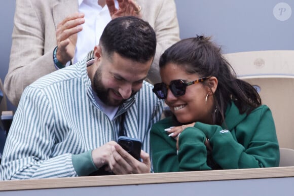 Inès Reg (Inès Reghioua) avec son meilleur ami Mickaël Montadir dans les tribunes au même moment dans les tribunes des Internationaux de France de tennis de Roland Garros 2024 à Paris, France, le 3 juin 2024. © Jacovides-Moreau/Bestimage  Celebs in the stands of the French Open tennis tournament at Roland Garros 2024 in Paris, France, on June 3, 2024. 