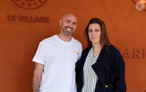 Julien Arruti et sa compagne Aurélie au village lors des Internationaux de France de tennis de Roland Garros 2024, à Paris, France, le 3 juin 2024. © Jacovides-Moreau/Bestimage  Celebs at the Village during the 2024 French Open at Roland Garros in Paris, France, on June 3, 2024. 